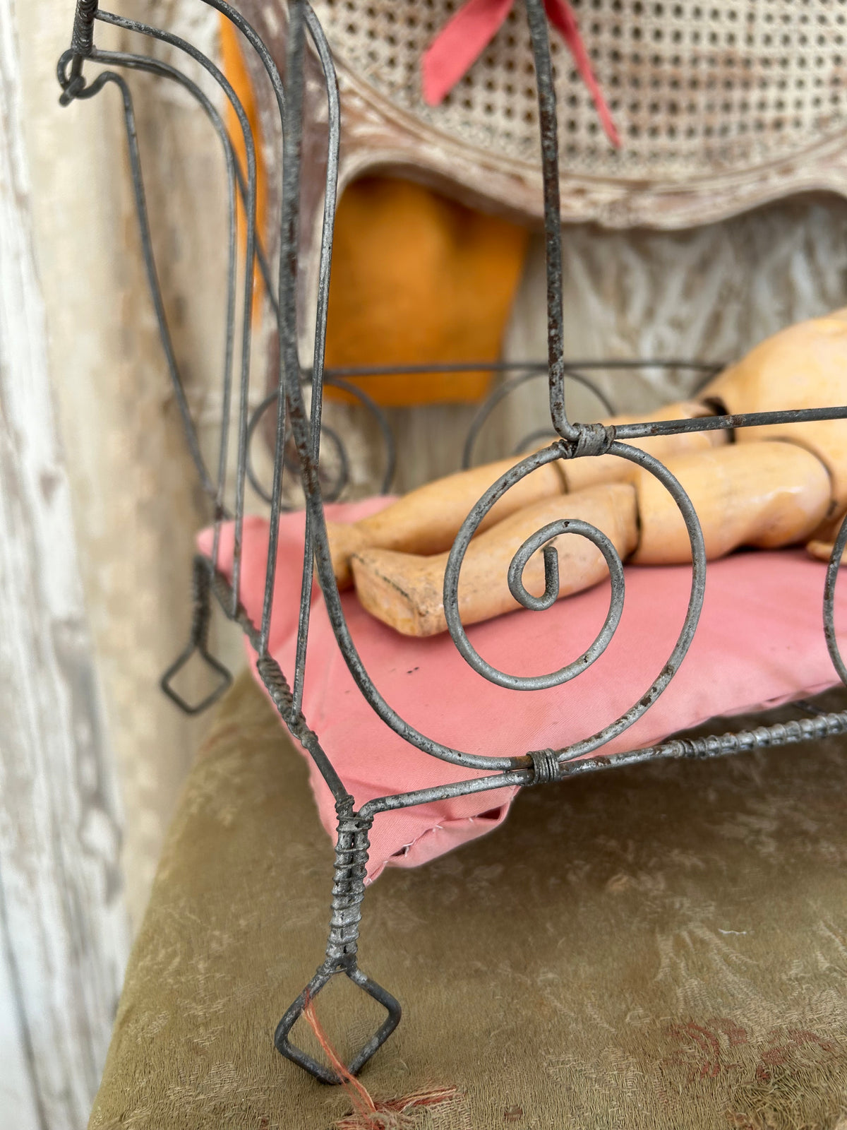 French antique doll bed with original mattress and pillows.