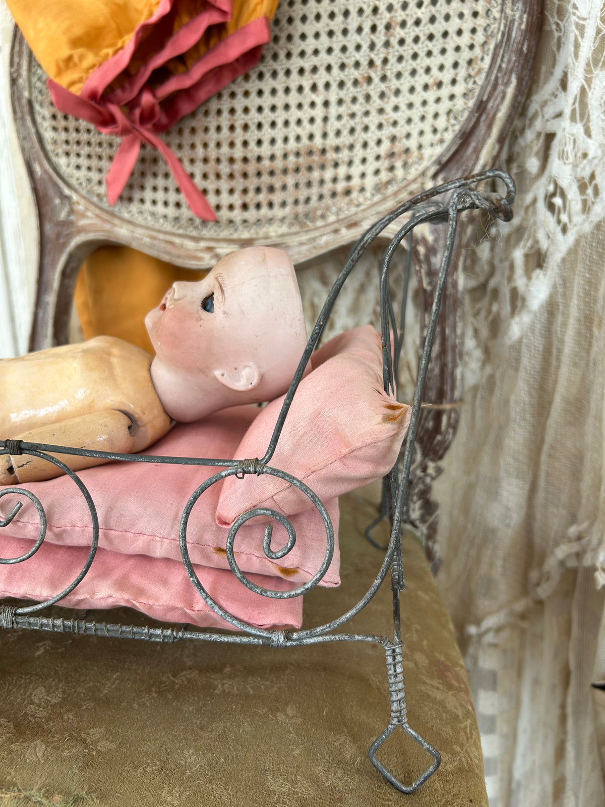 French antique doll bed with original mattress and pillows.