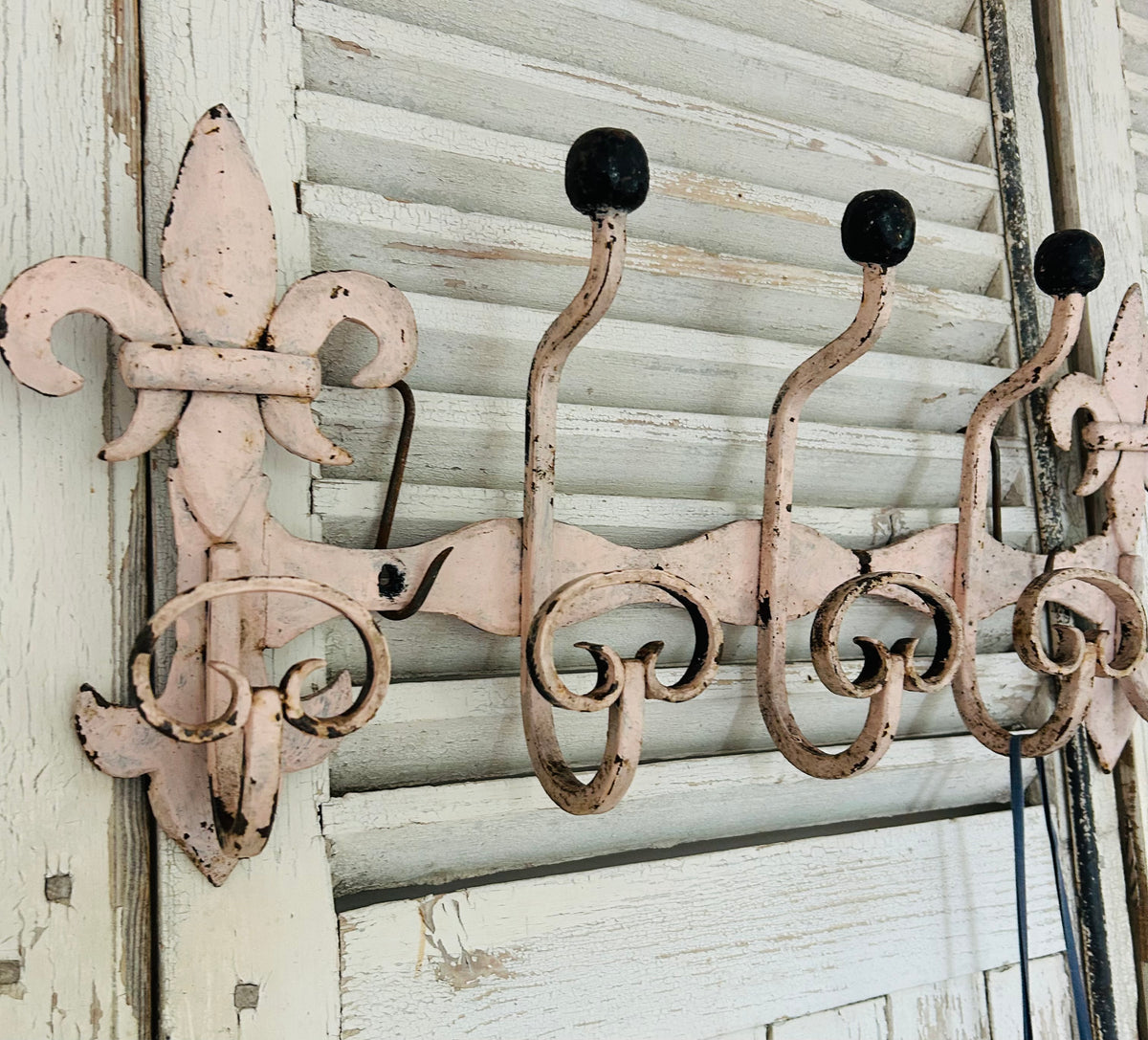 Antique estate made chateau cast iron hooks.
