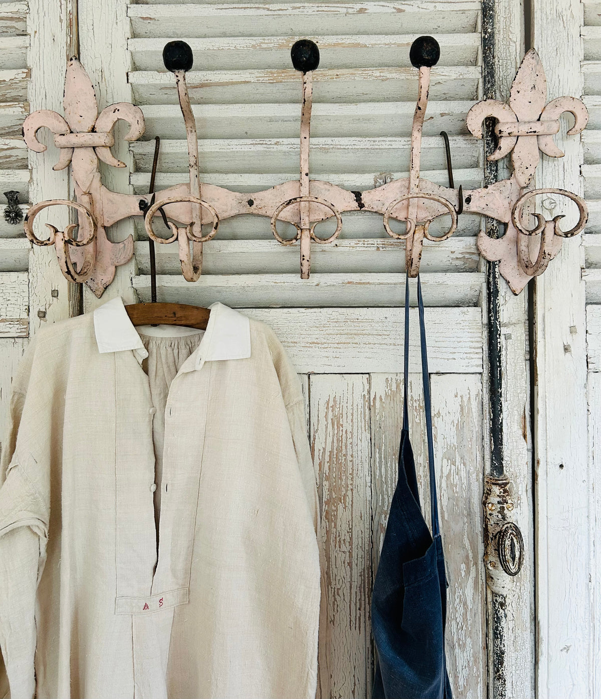 Antique estate made chateau cast iron hooks.