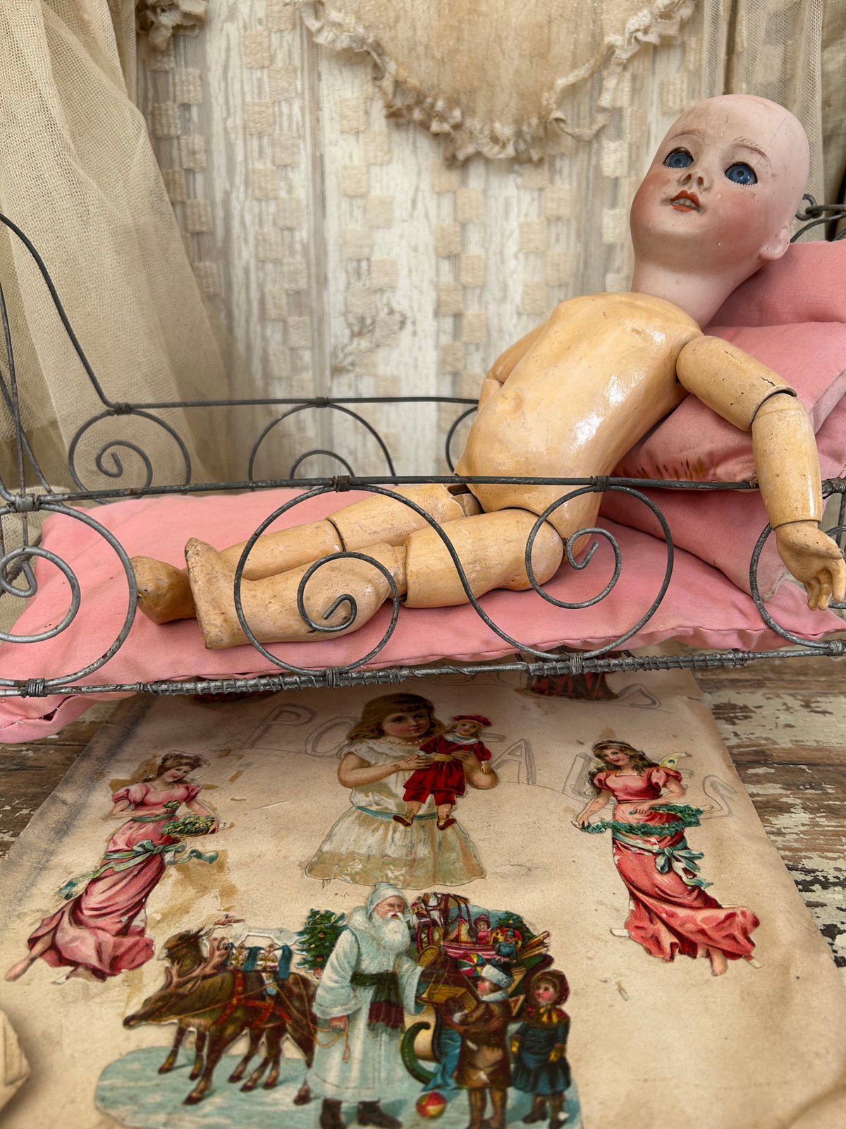 French antique doll bed with original mattress and pillows.