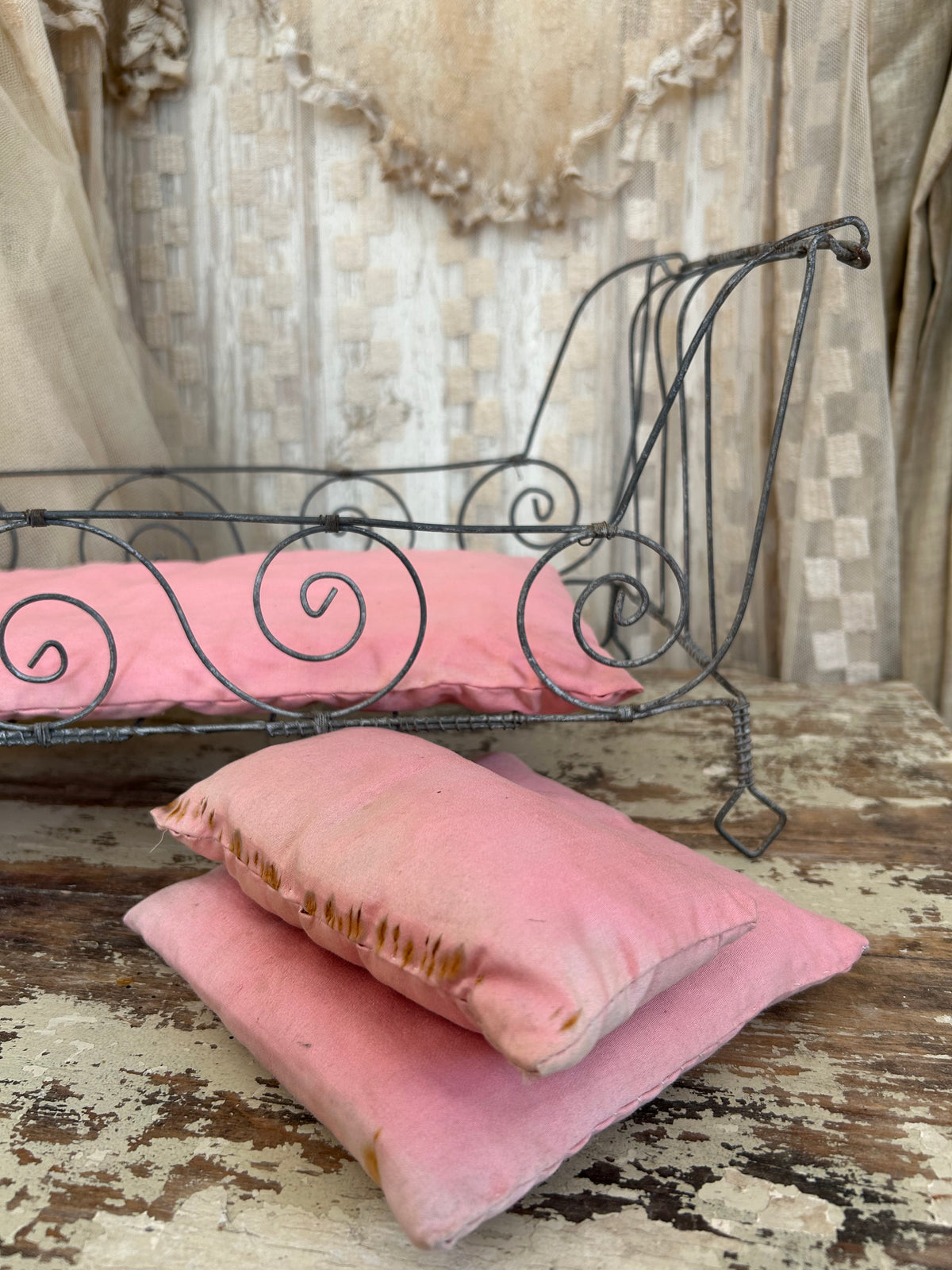 French antique doll bed with original mattress and pillows.