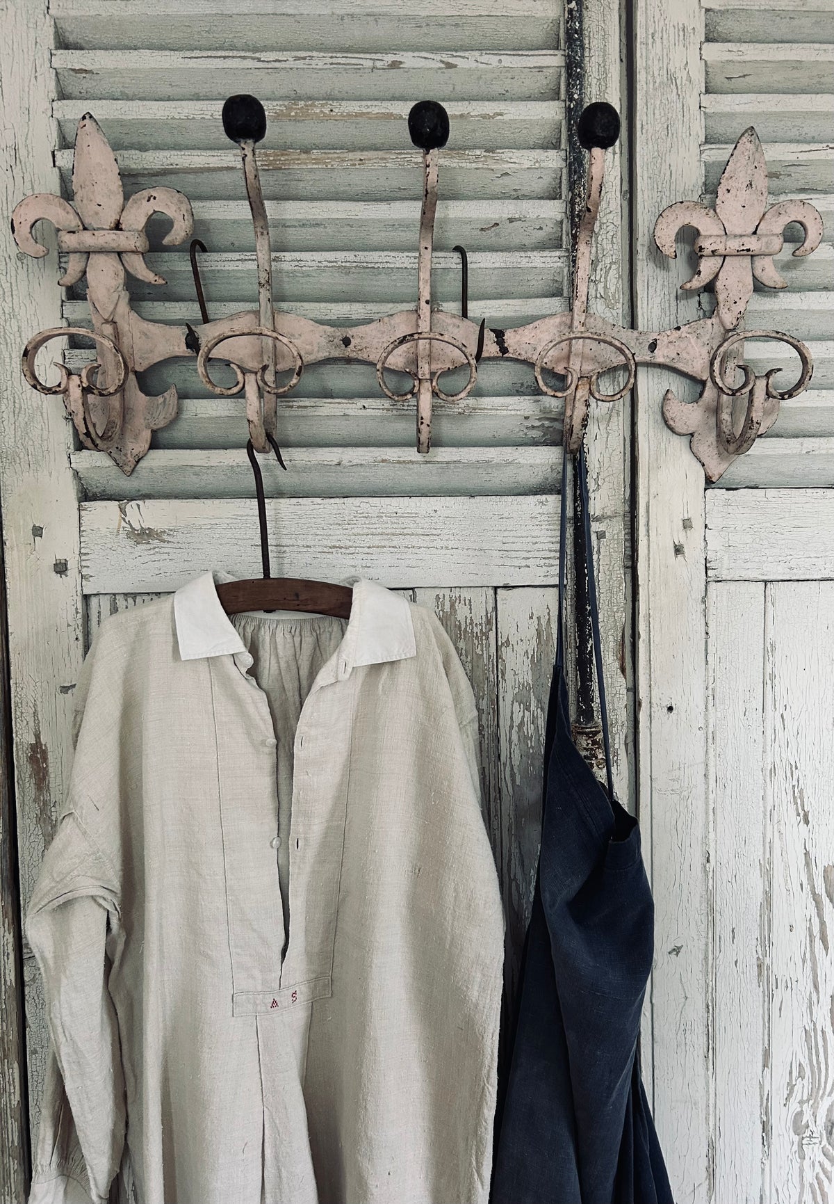 Antique estate made chateau cast iron hooks.