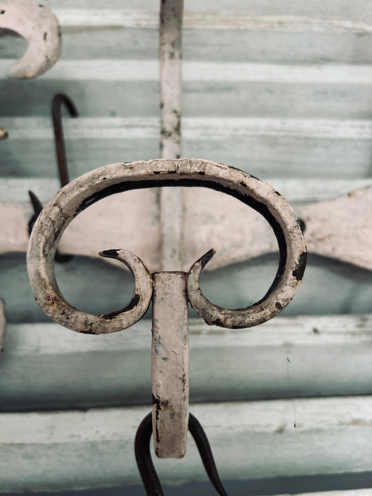 Antique estate made chateau cast iron hooks.