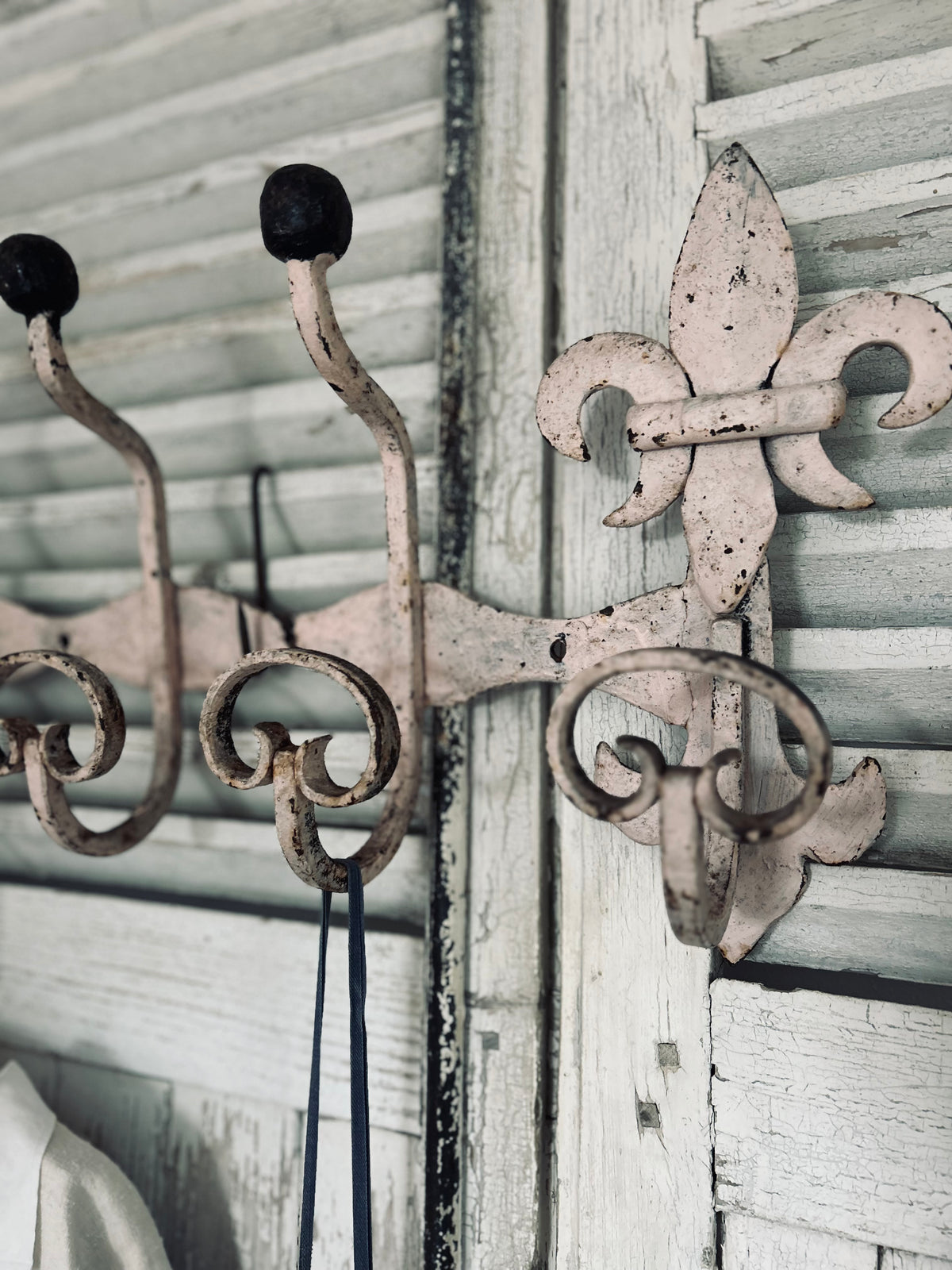 Antique estate made chateau cast iron hooks.