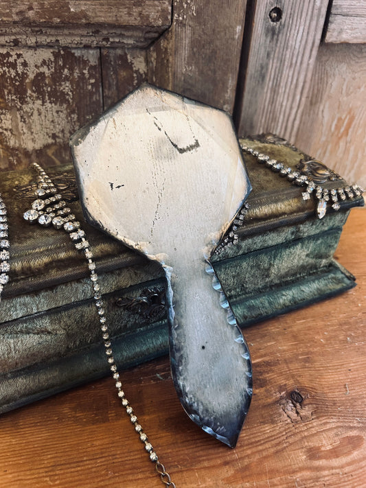 Small antique hand held french mirror