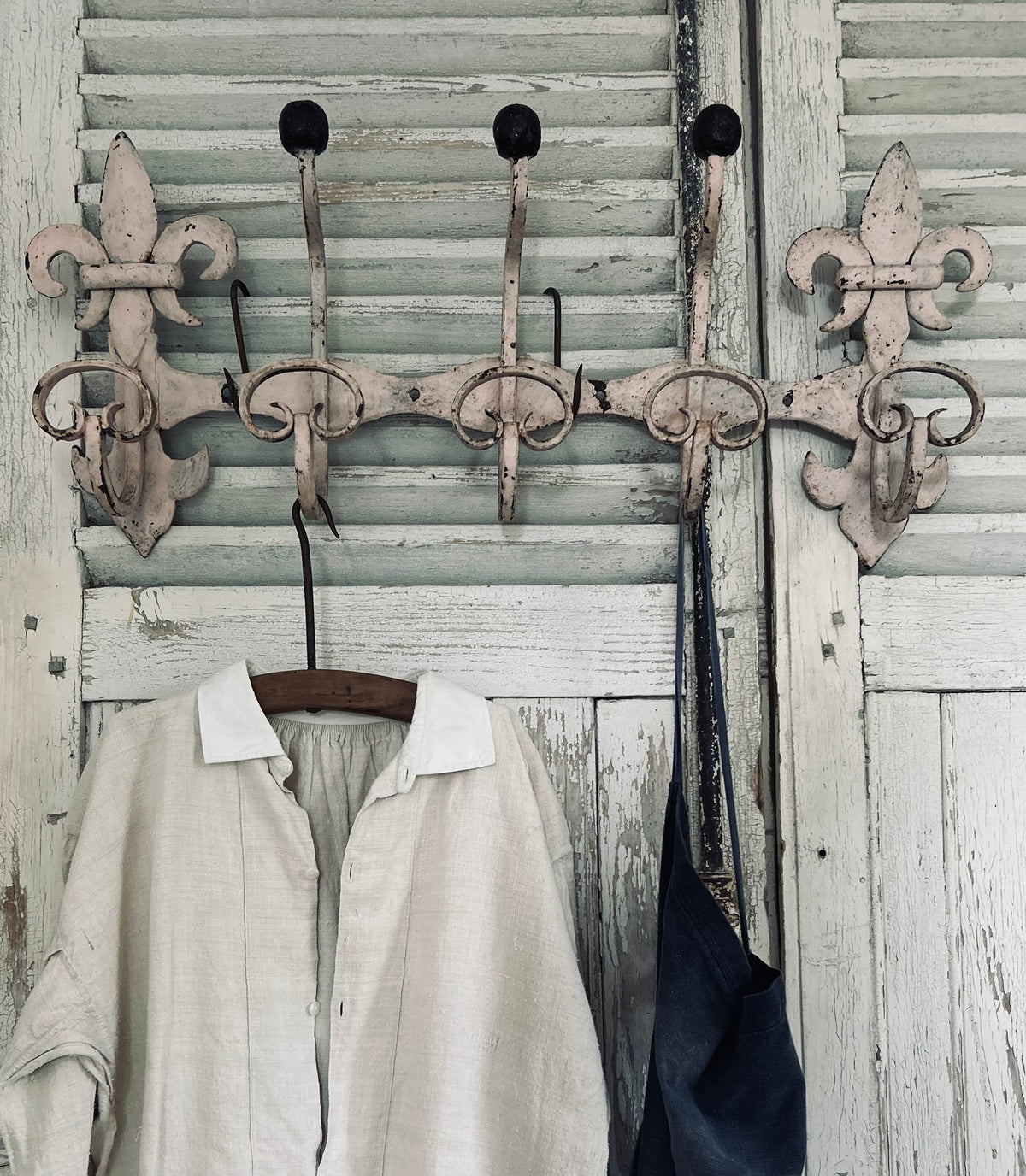 Antique estate made chateau cast iron hooks.